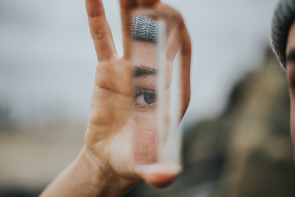 Portrait of eye reflected in the mirror