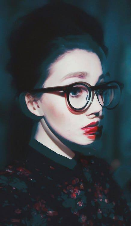 artistic graphic of young woman wearing glasses