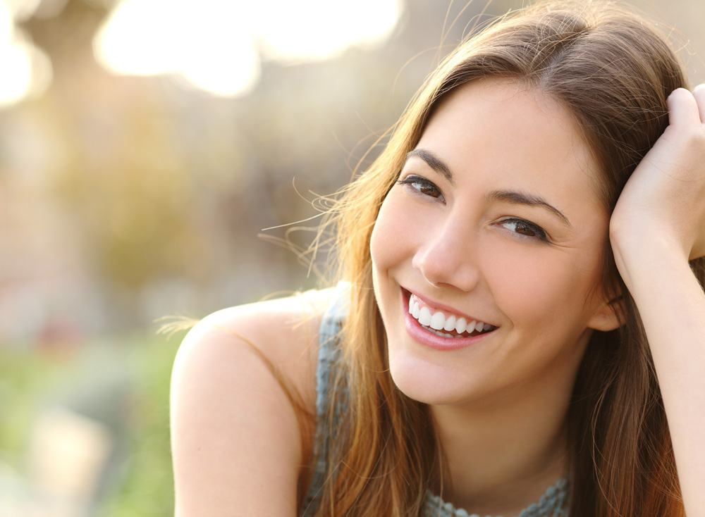 happy woman outside smiling