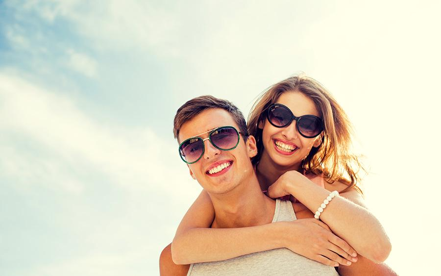 happy couple wearing glasses