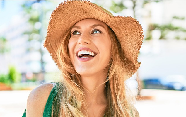 DLV Vision smiling young woman with implantable contact lenses