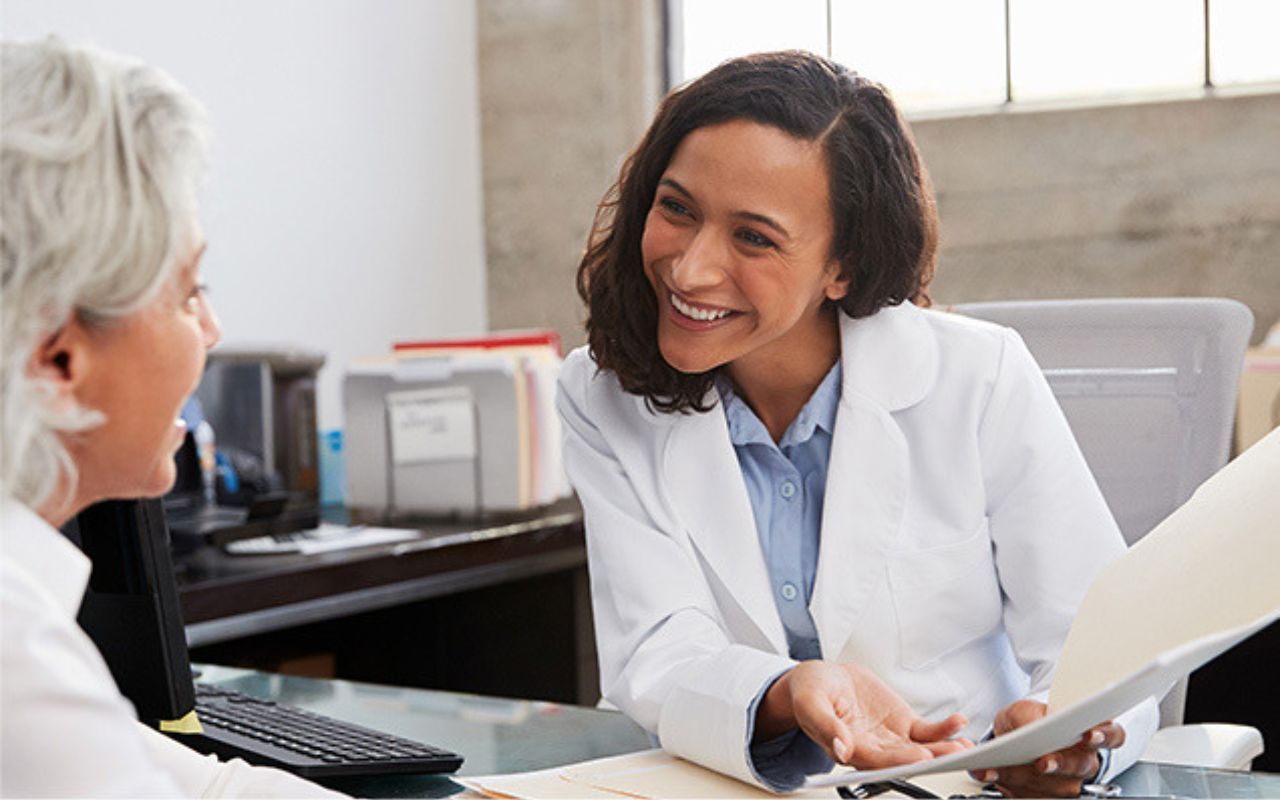 optometrist consulting with a patient