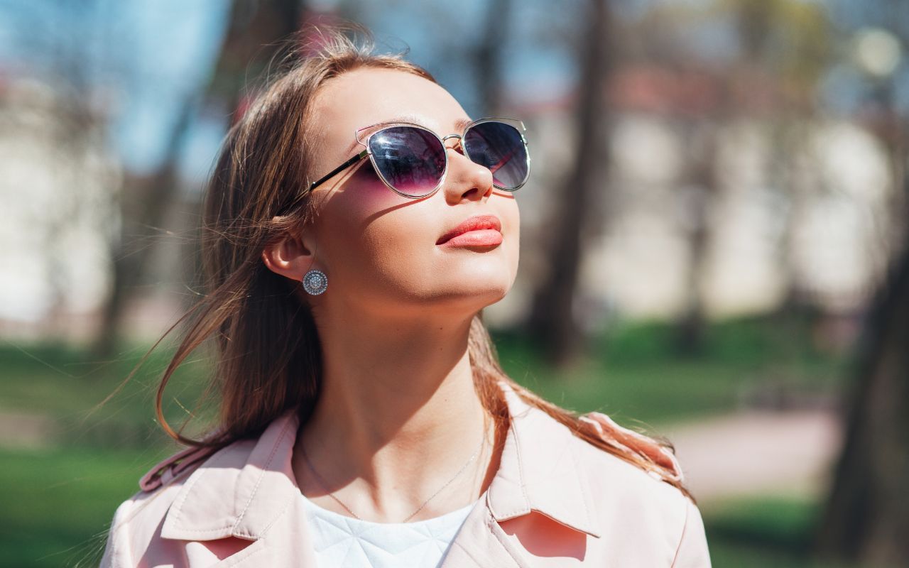 pretty woman enjoying outside life after lipiflow