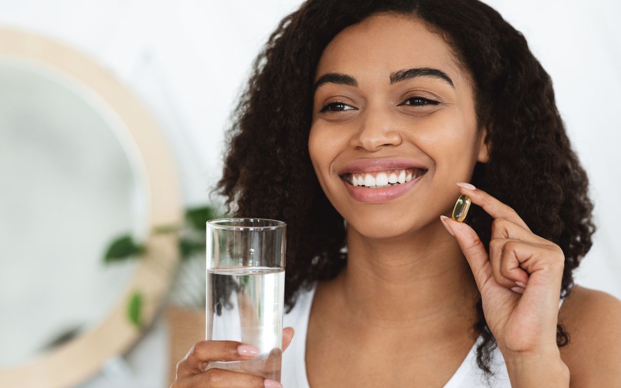 woman taking her vitamins