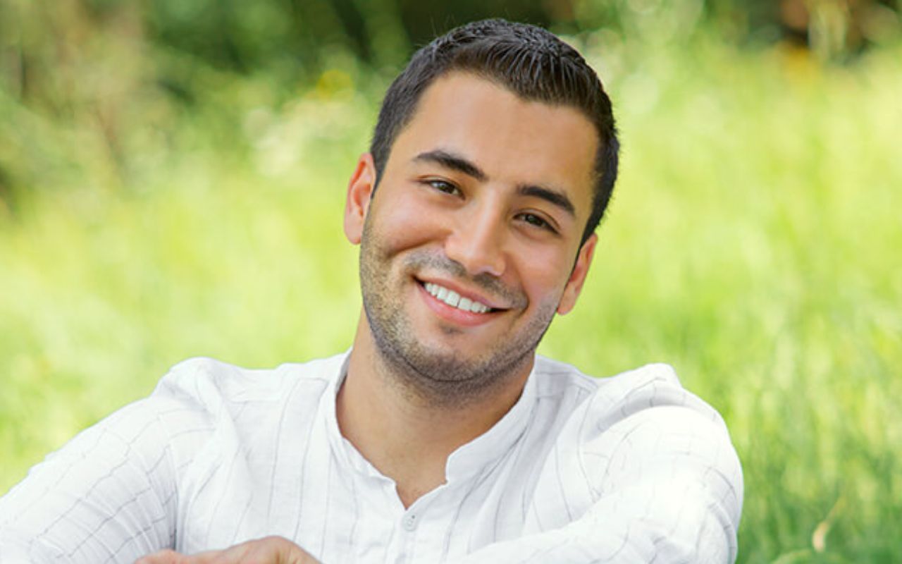 Young man smiling, happy with the DLV experience. 